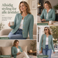 Kabelstrikket cardigan med rund hals og gullknapper