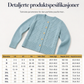 Kabelstrikket cardigan med rund hals og gullknapper